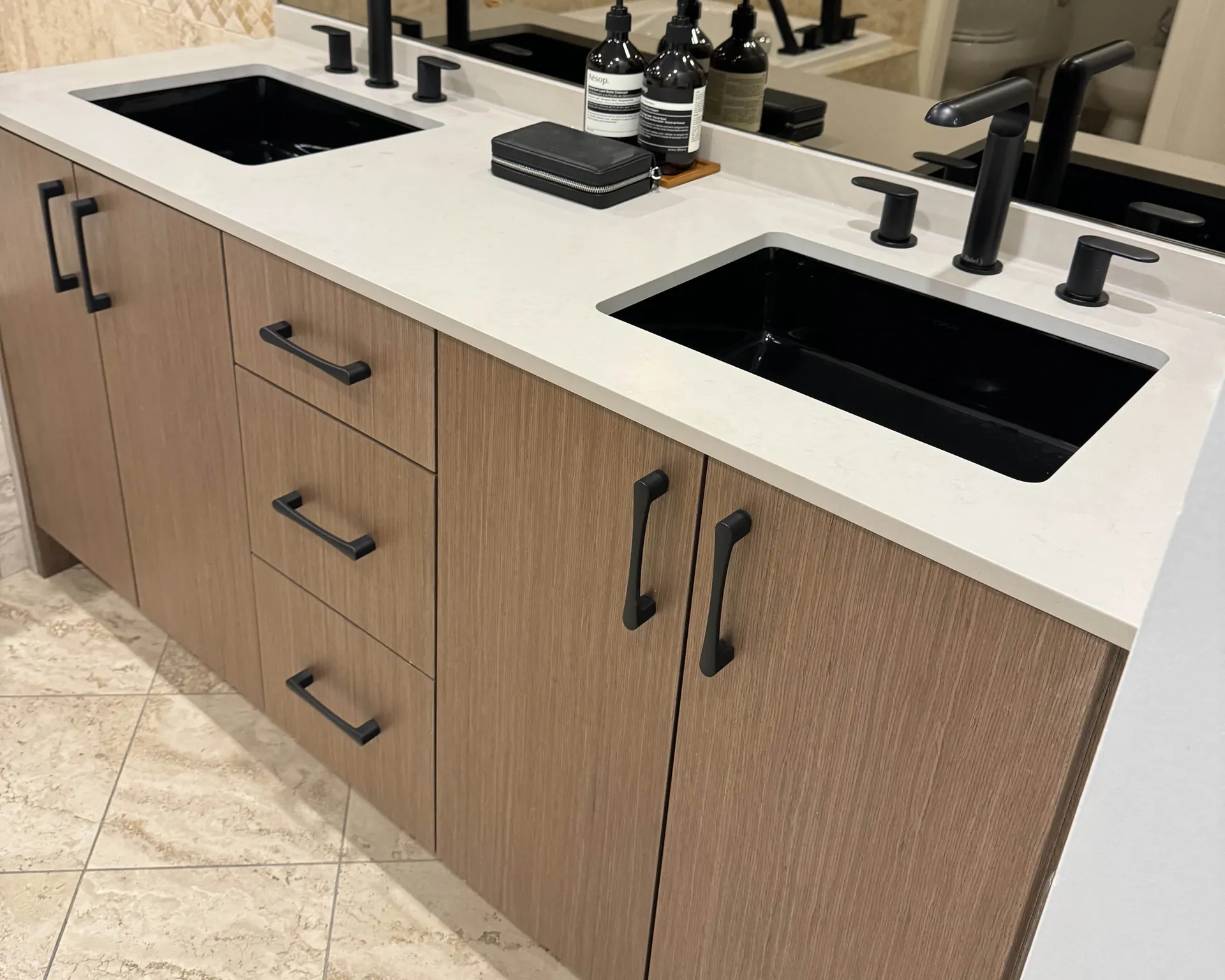 Floating double-sink bathroom vanity with custom storage