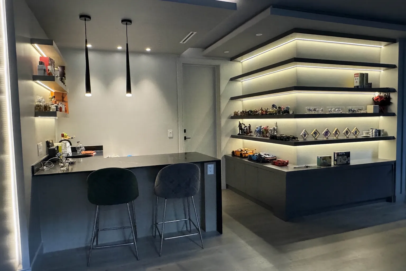 Integrated bar with illuminated open shelving