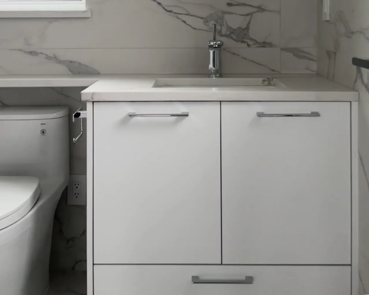 Marble & White Vanity — A crisp white cabinetry paired with a white marble countertop and walls for a premium look.